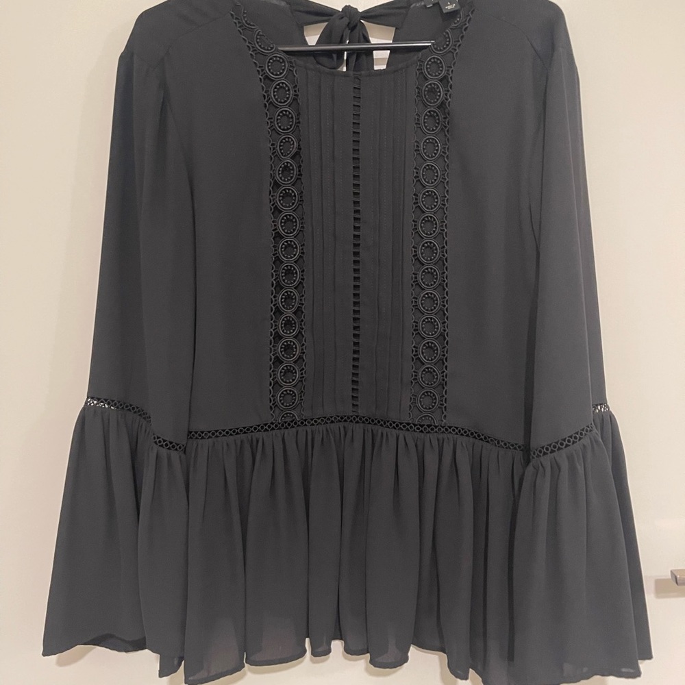Size small Ann Taylor black blouse with lace design and wide sleeves